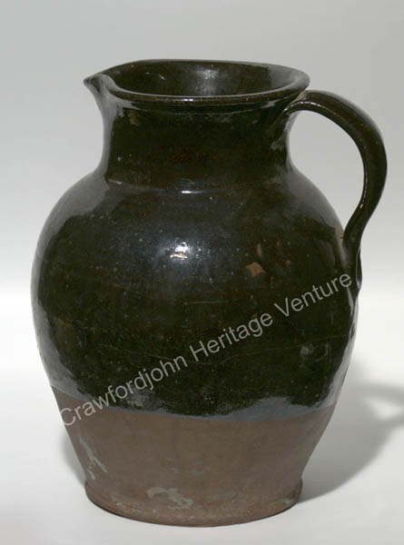 Dark blue earthenware jug